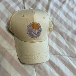 Unisex sun cap for beach or sports comes in white or black or cream colored.